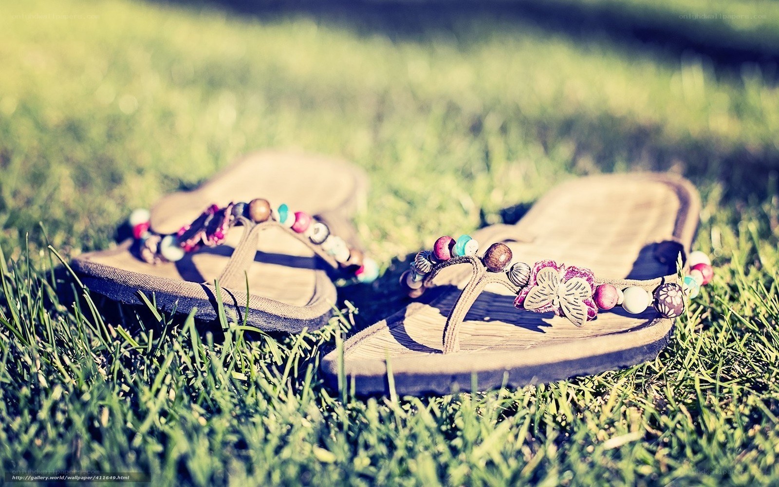 beaded sandals on grass