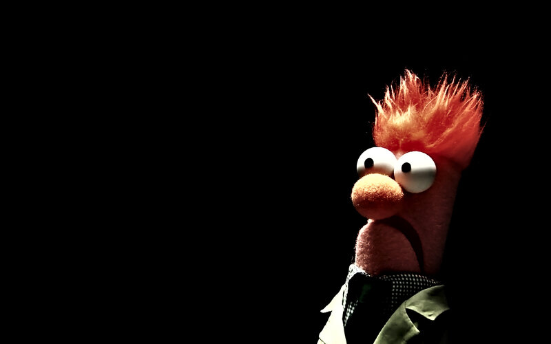 Beaker puppet in spotlight