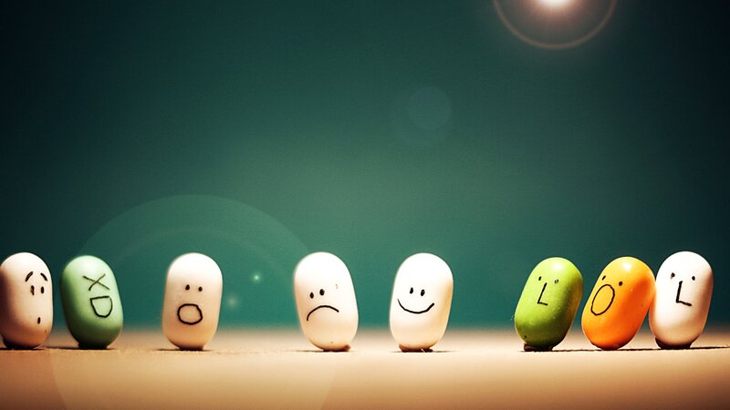 beans with faces in a row