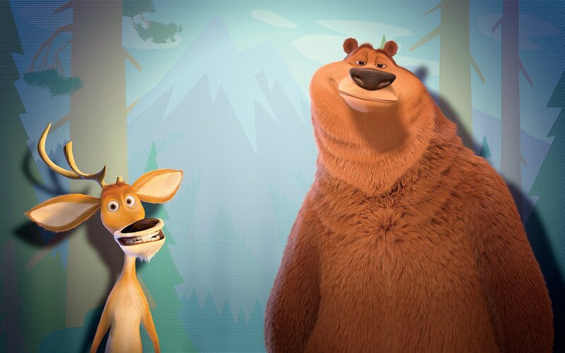 Bear and deer in forest
