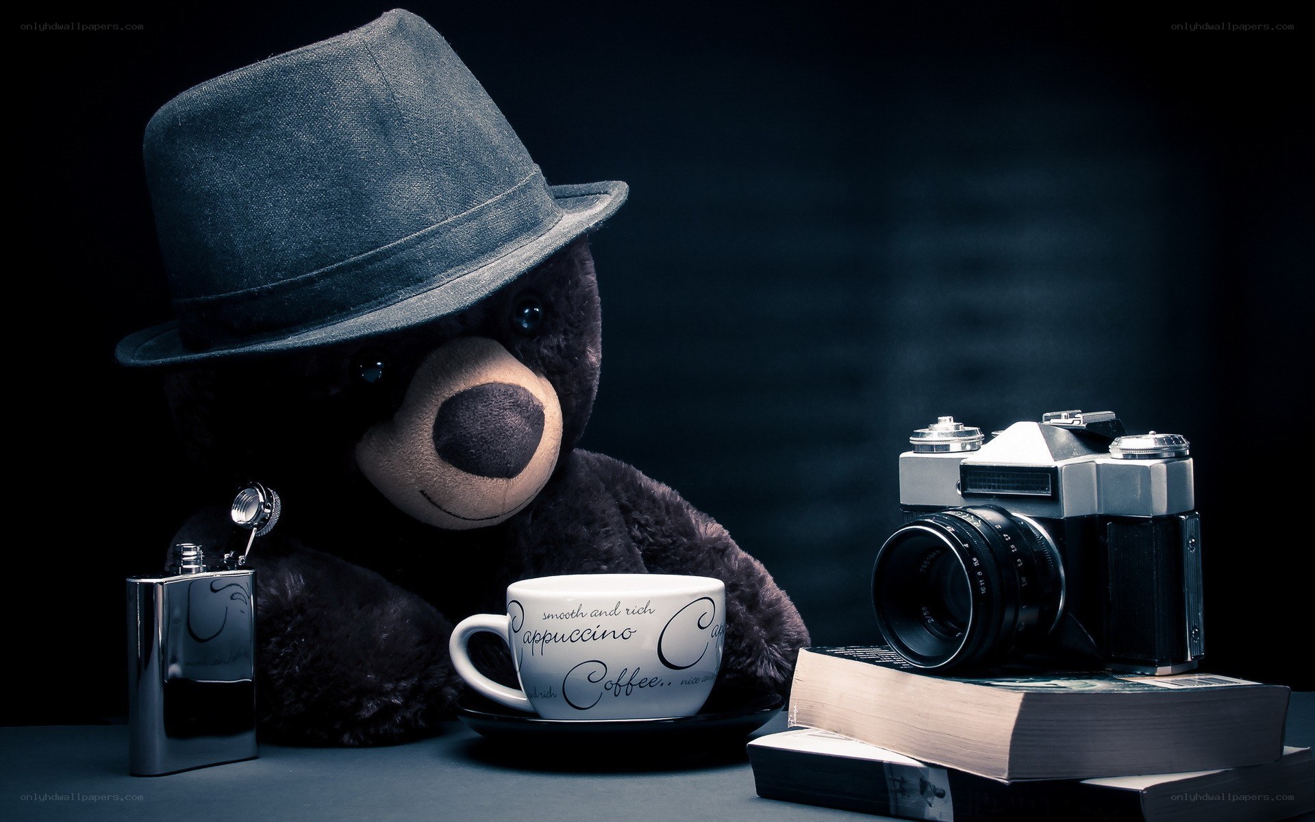 Bear with camera and coffee