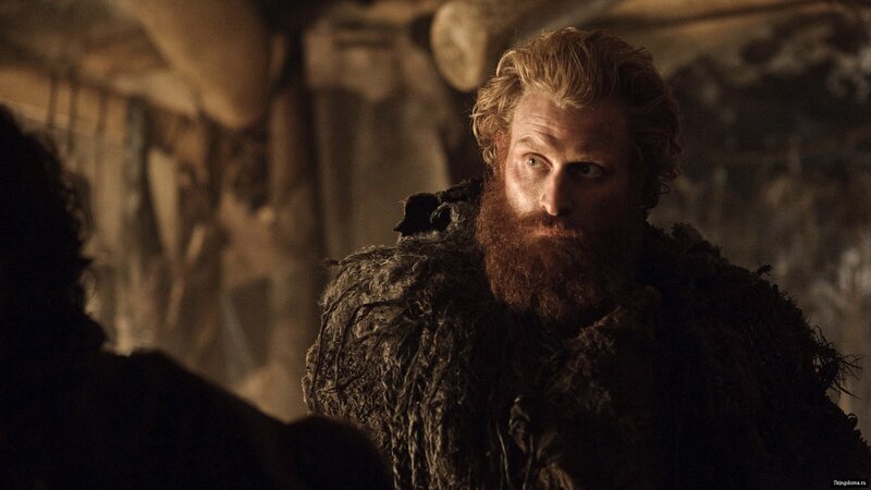 bearded man in fur cloak
