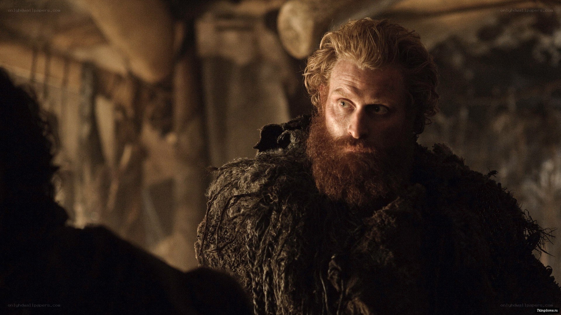 bearded man in fur cloak