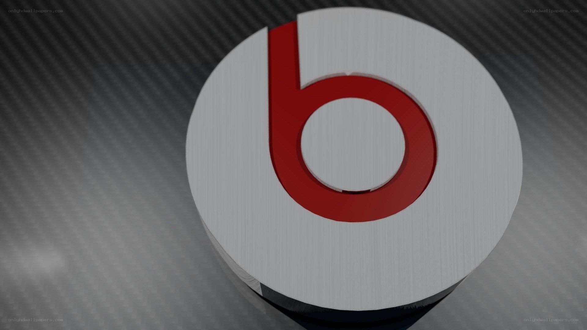 Beats by Dre logo on carbon fiber