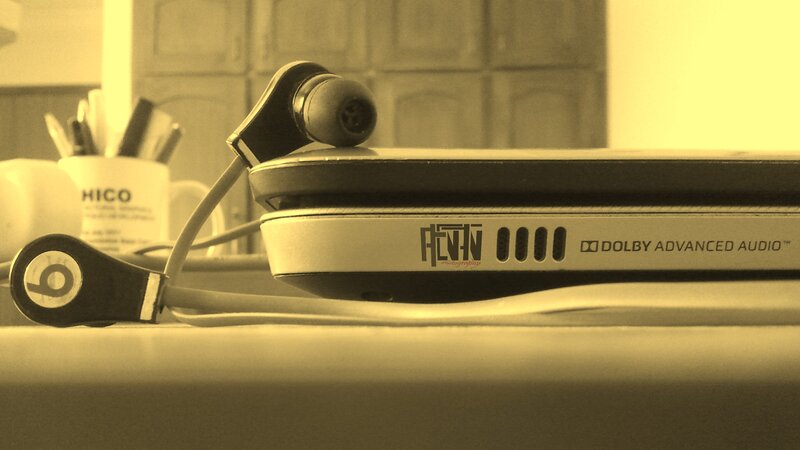 Beats Headphones on Laptop — Sepia