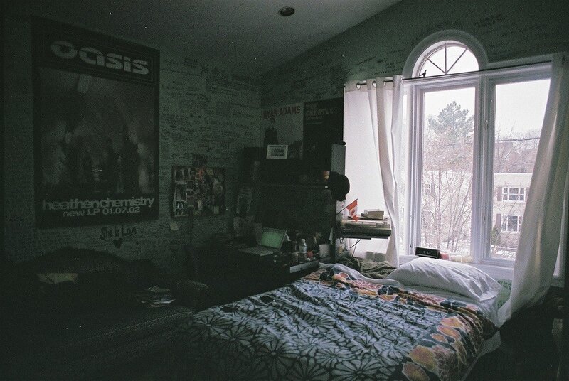 Bed in a Cluttered Room
