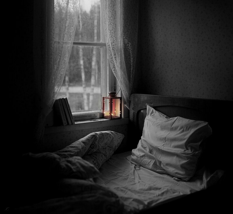 Bed in Dimly Lit Room