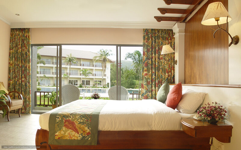 Bed in Tropical Hotel Room