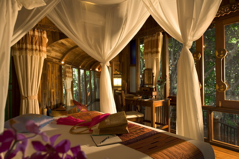 Bed in Wooden Cabin
