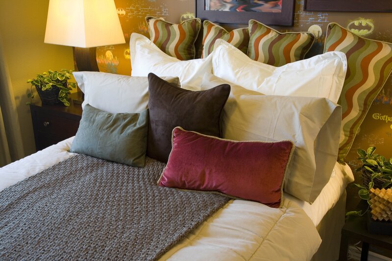 Bed with decorative pillows