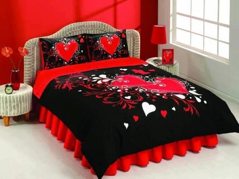 Bed with Red and Black Bedding