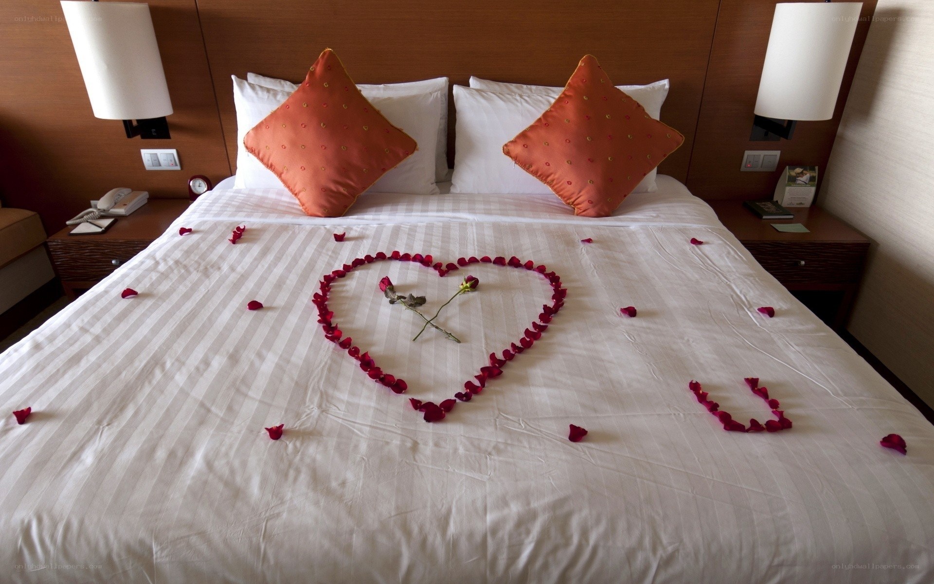 Bed with rose petal heart