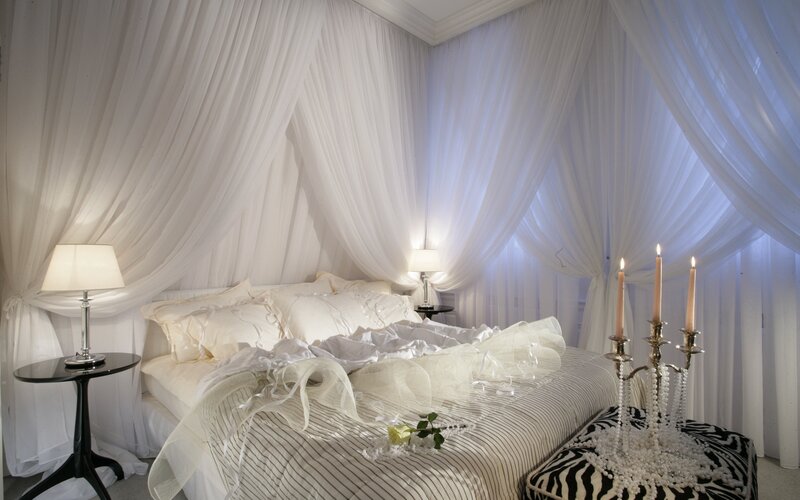 Bed with White Canopy