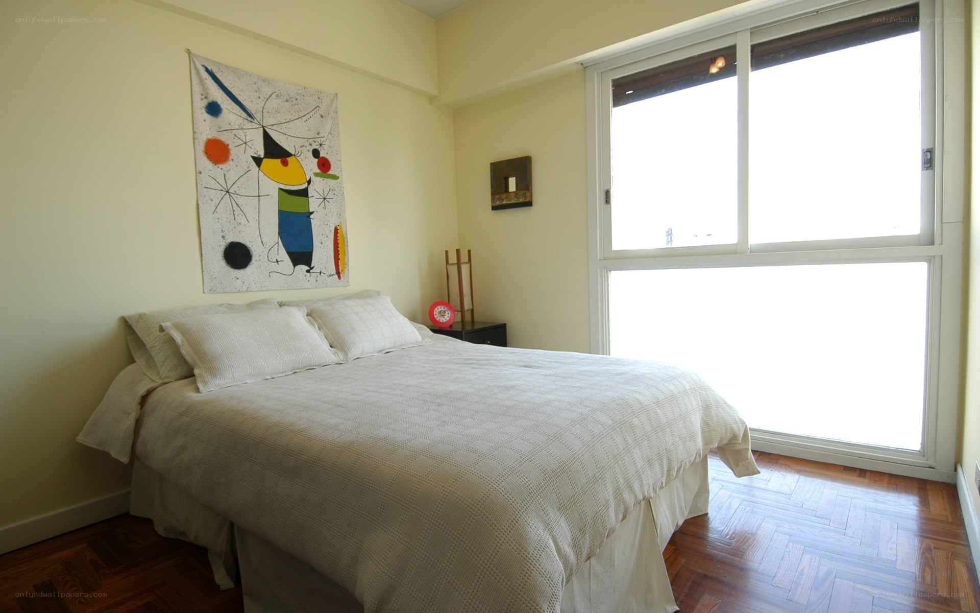 Bedroom with abstract art