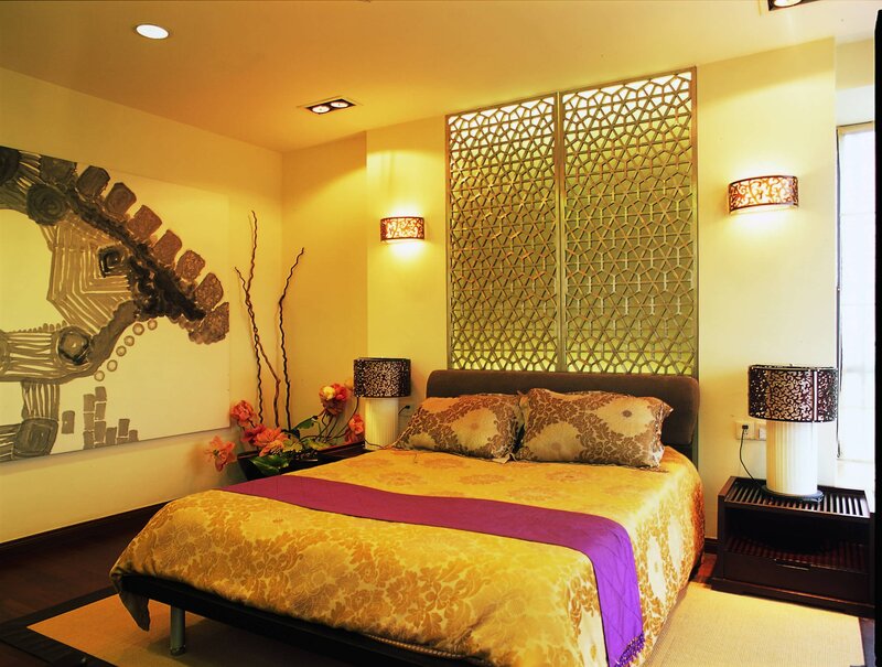 Bedroom with decorative screen