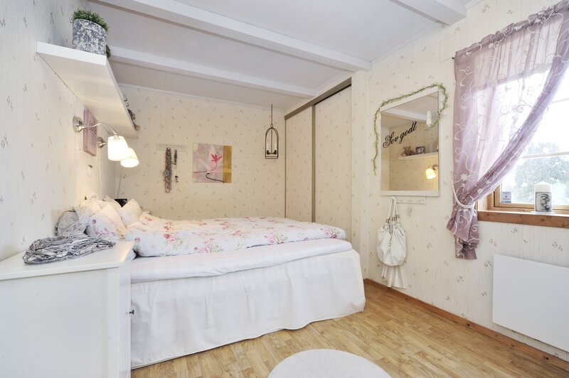 Bedroom with Floral Bedding — White