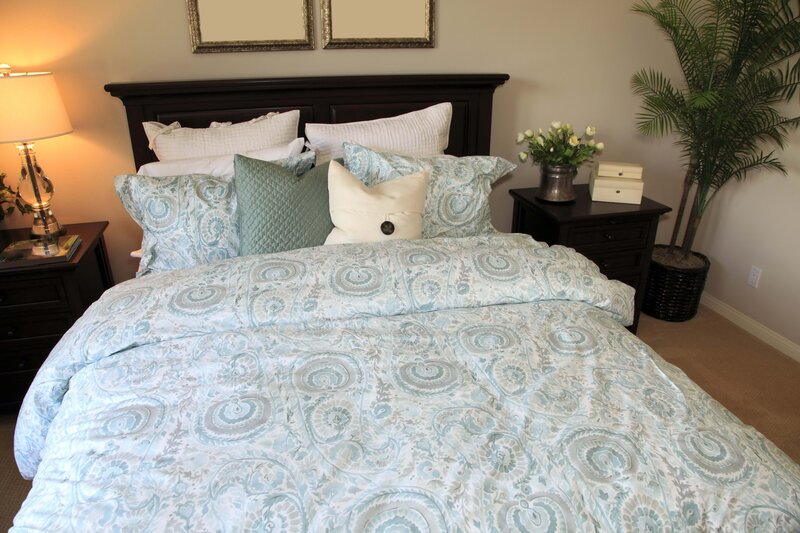 Bedroom with patterned bedding