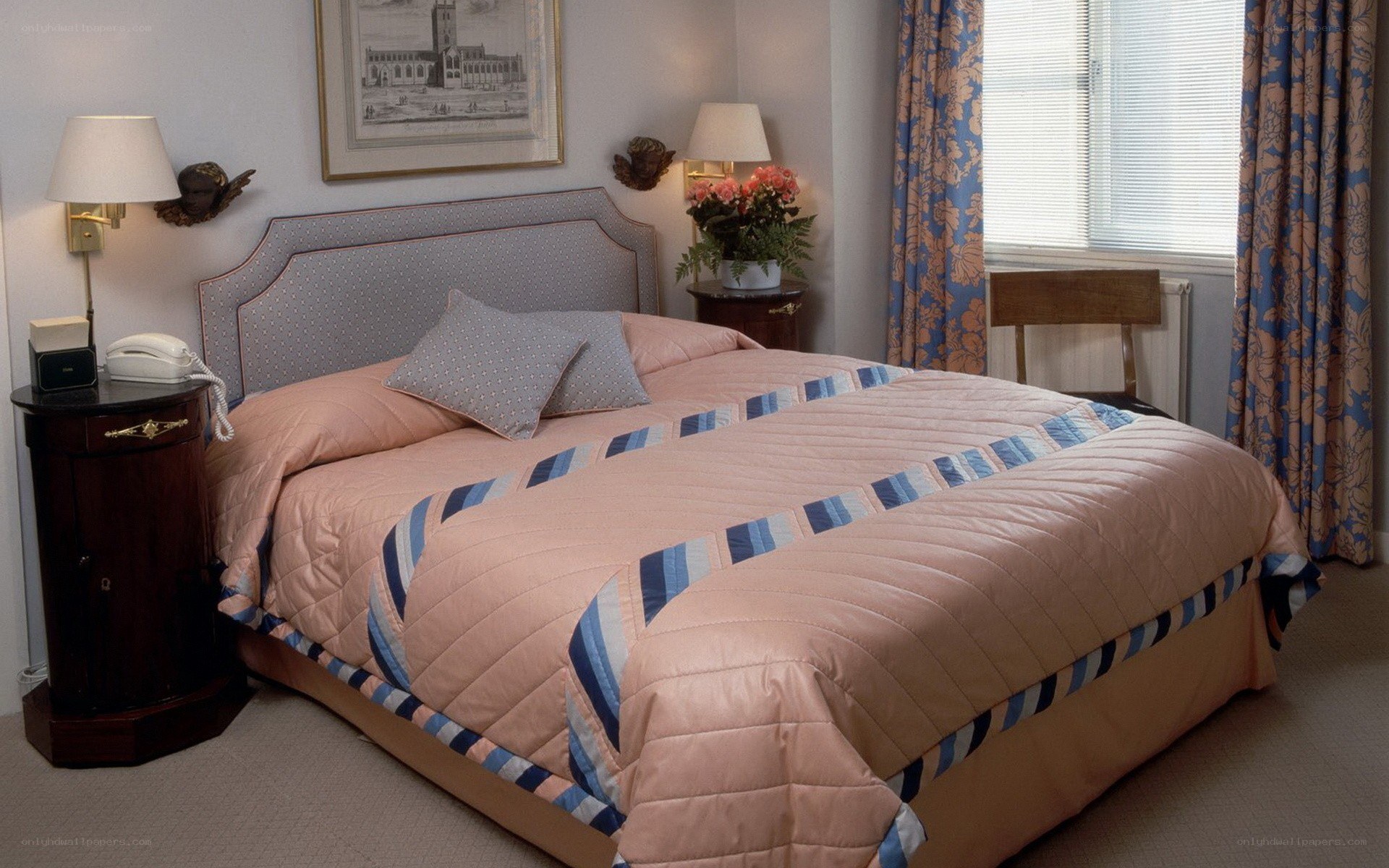 Bedroom with pink quilt