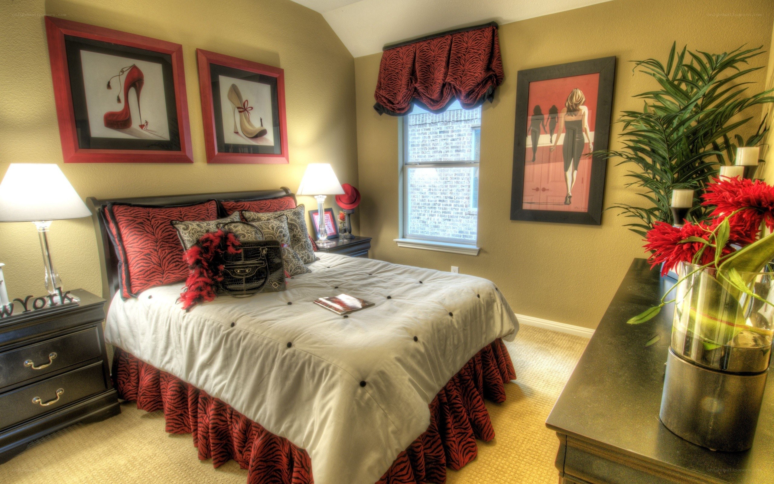 bedroom with red and black decor
