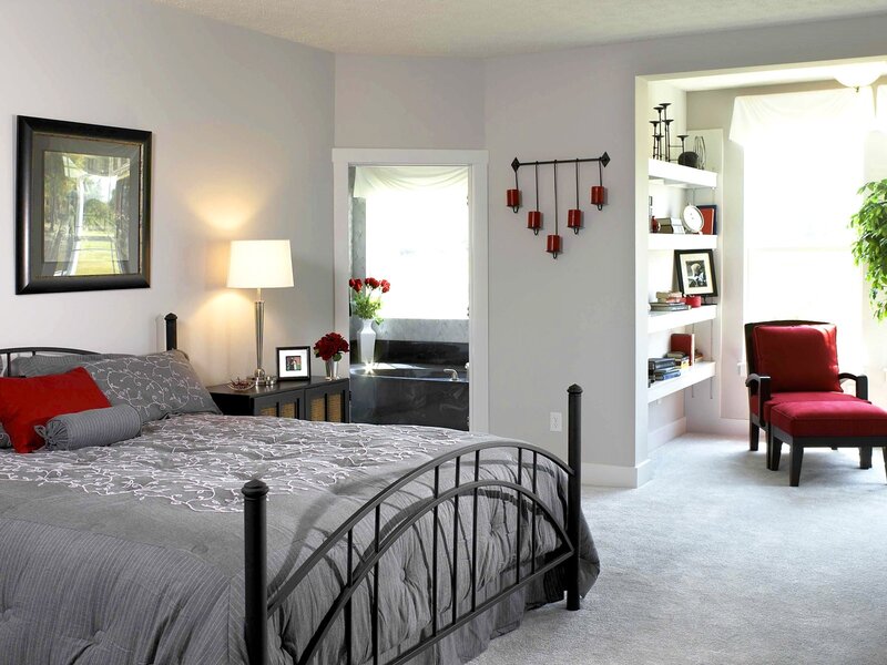 Bedroom with Red Chair