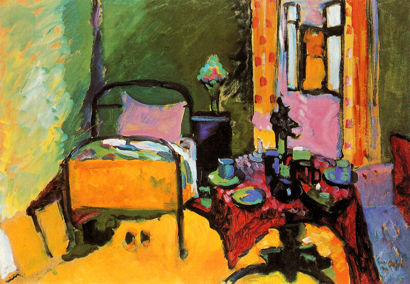 Bedroom with Table and Flowers