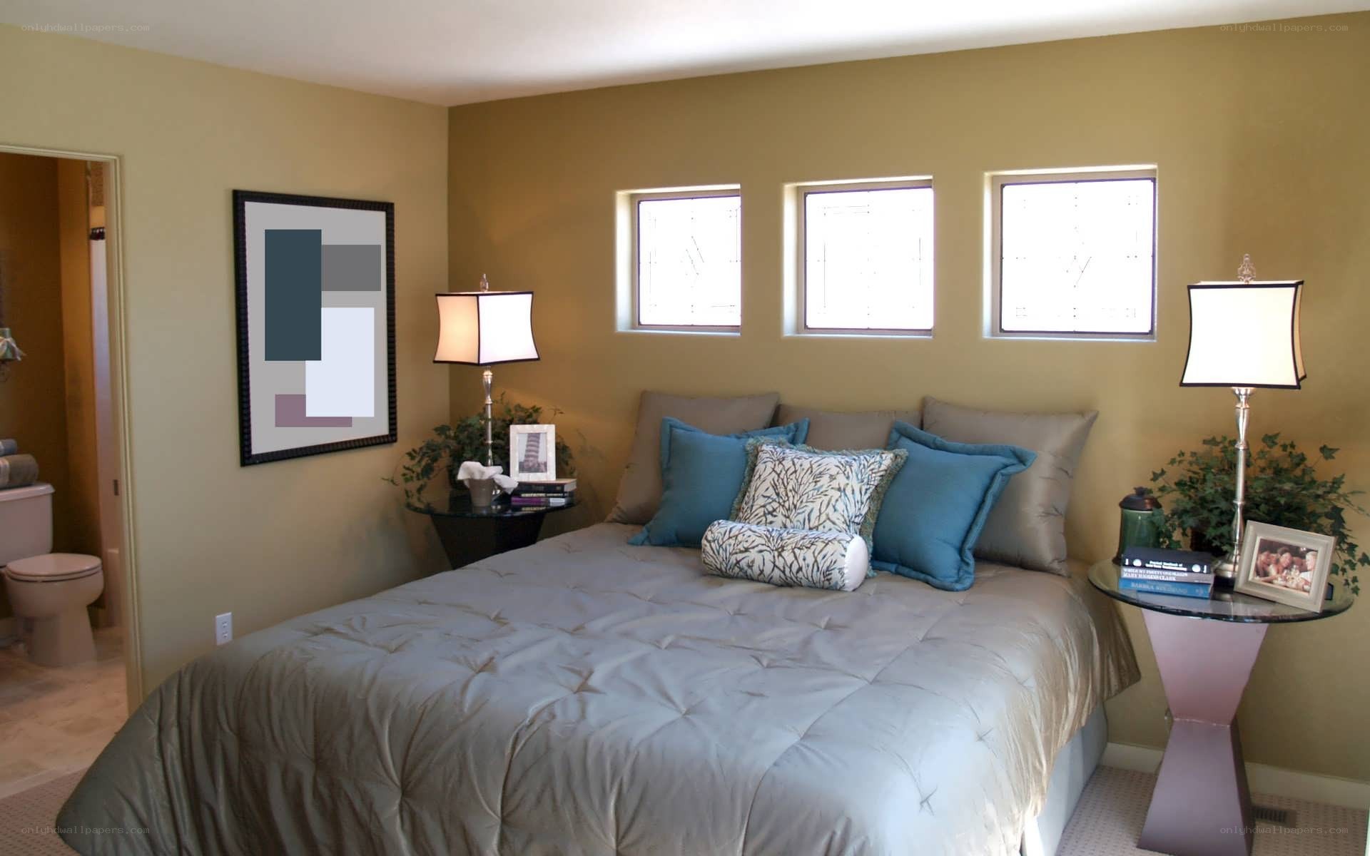 bedroom with three windows