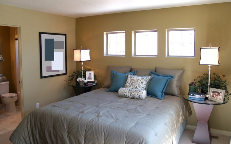 Bedroom with three windows