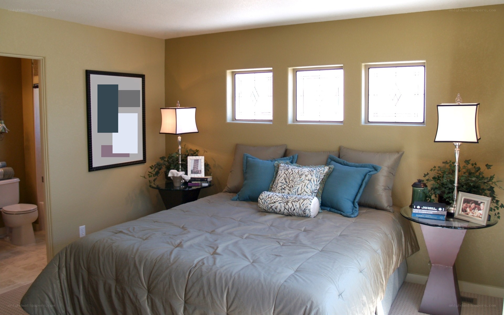 Bedroom with three windows