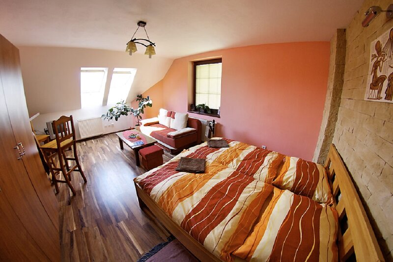 Bedroom with Wooden Bed — Orange