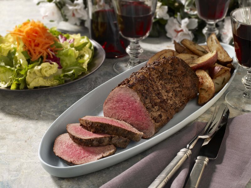 Beef roast with salad and wine