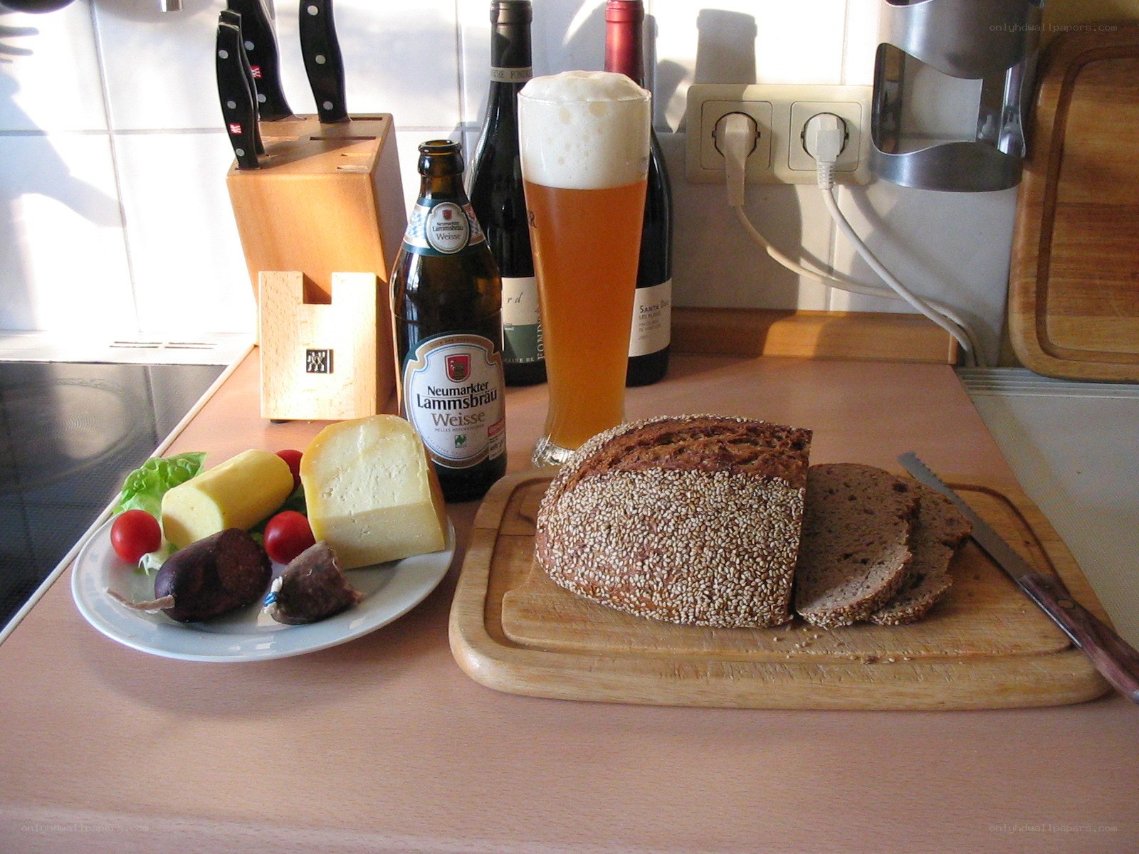 Beer and bread on kitchen counter