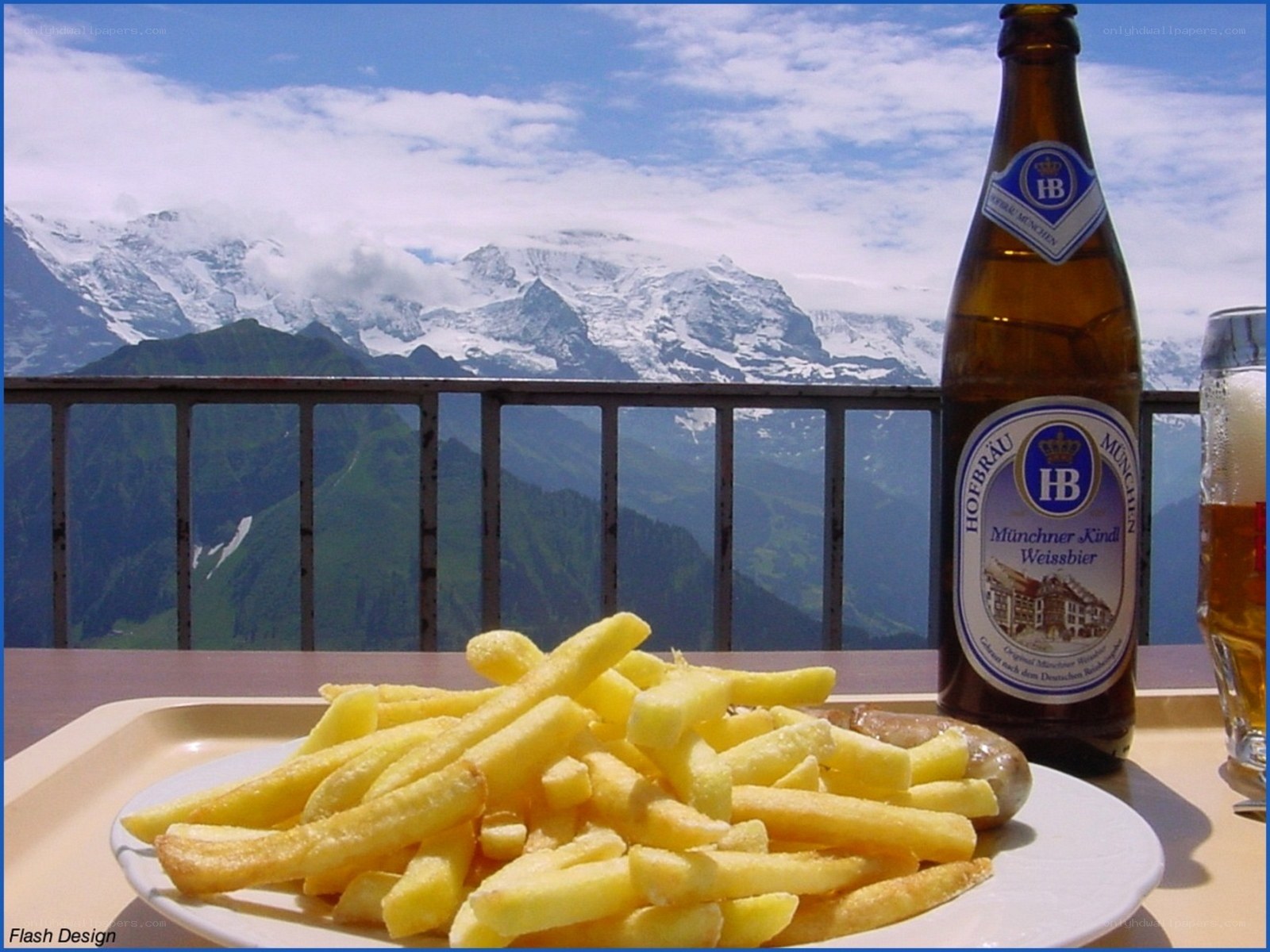 Beer and fries with mountain view