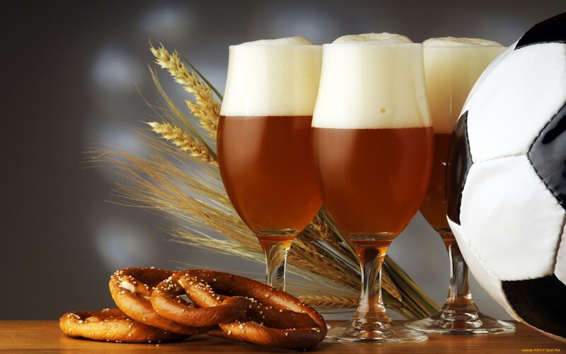 Beer and pretzels with soccer ball
