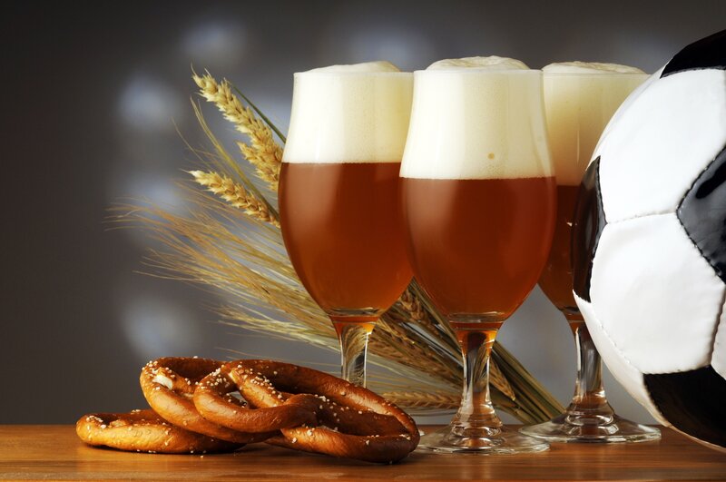 Beer and pretzels with soccer ball