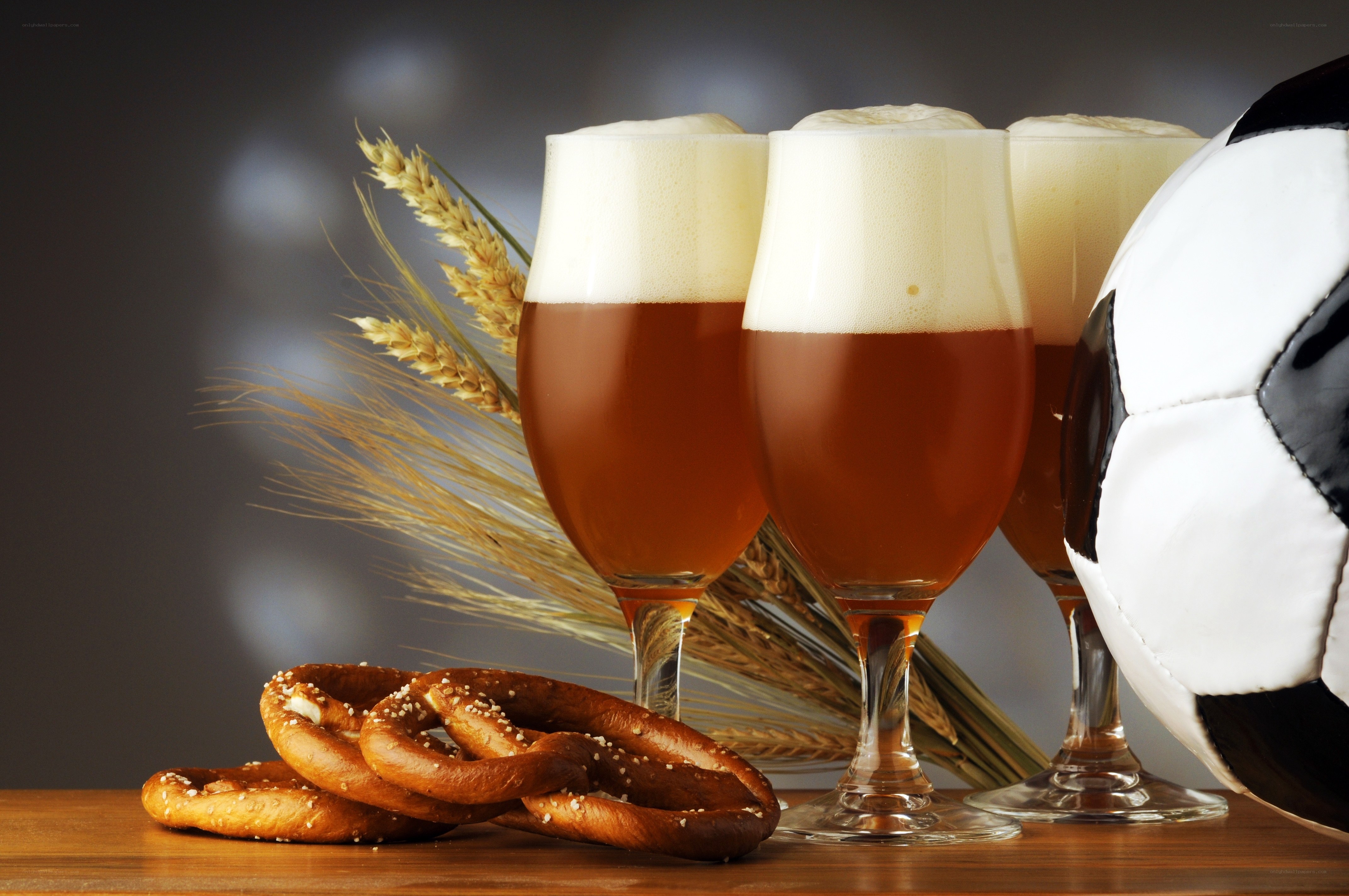 Beer and pretzels with soccer ball