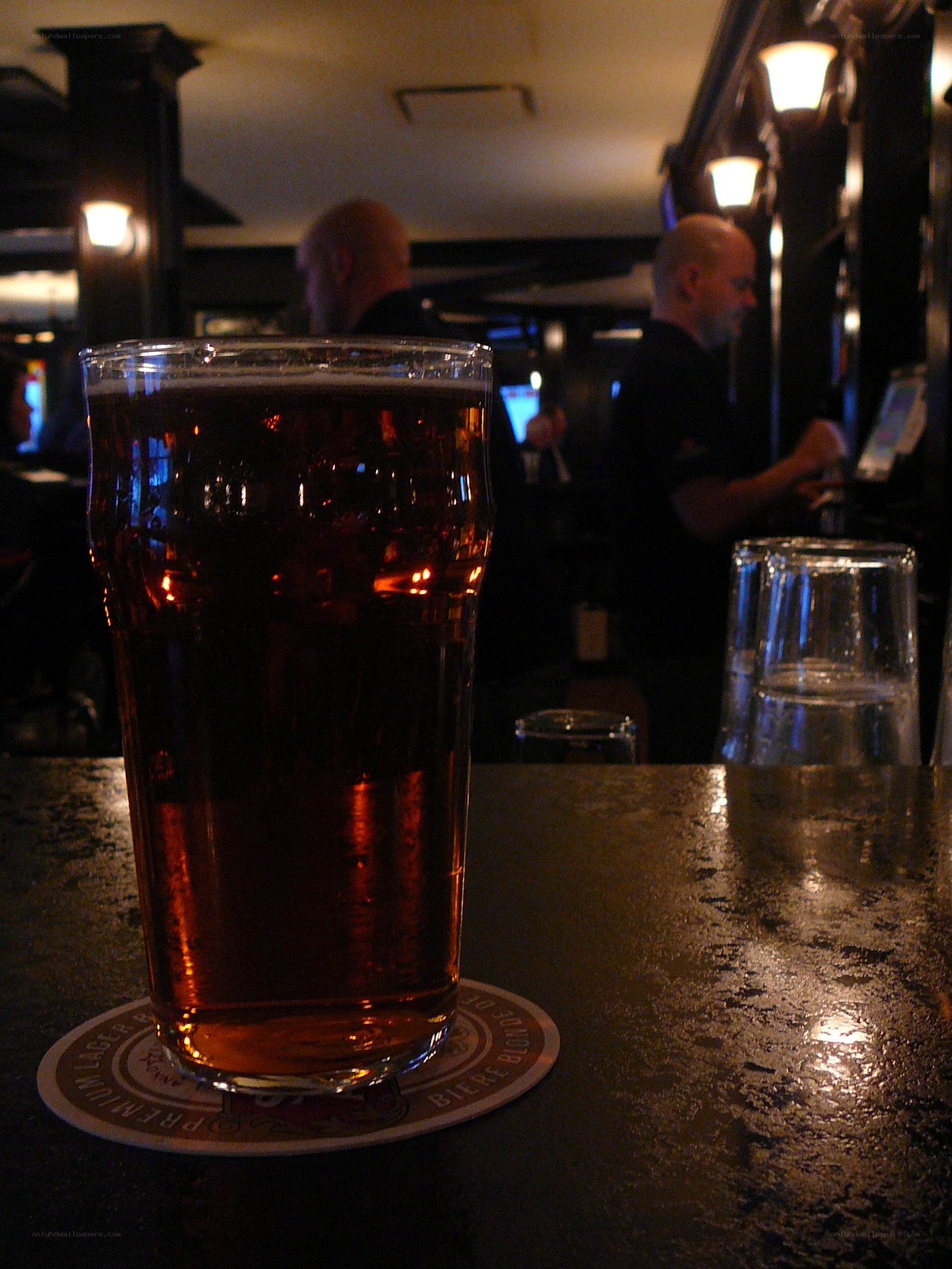 beer at a dimly lit bar