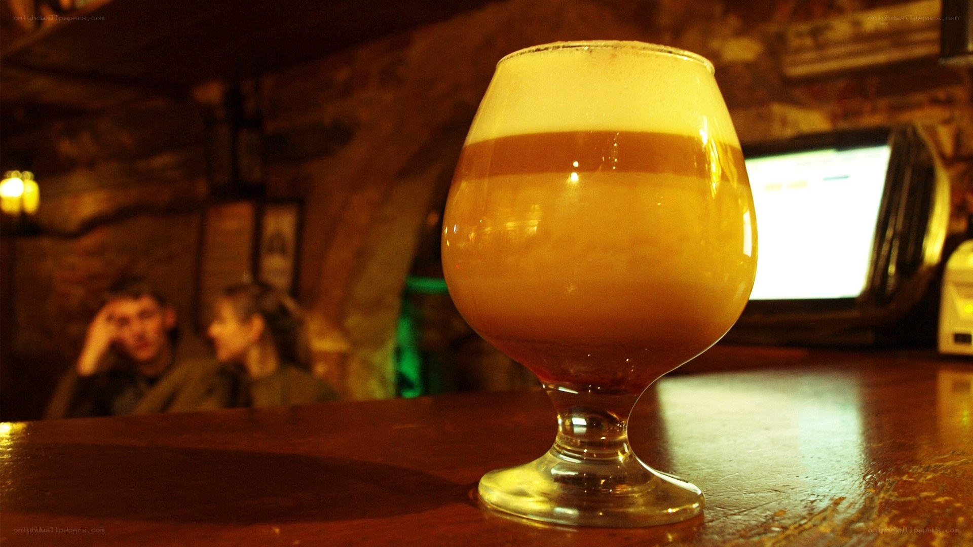Beer in a glass on a bar