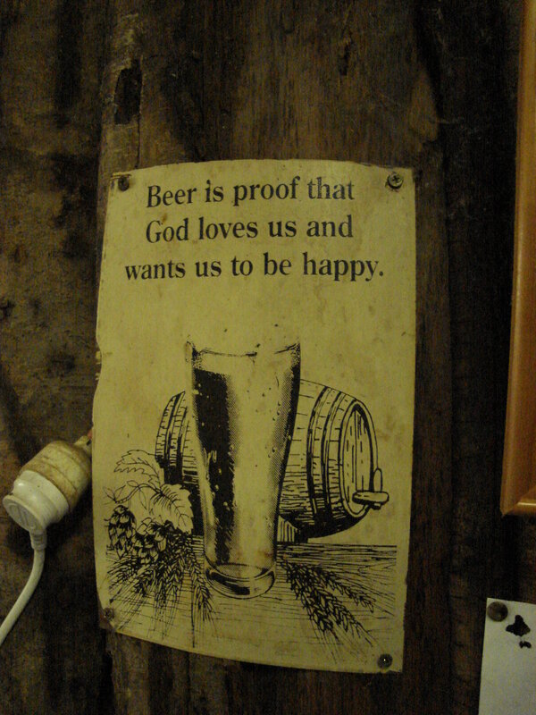 Beer sign on wood wall