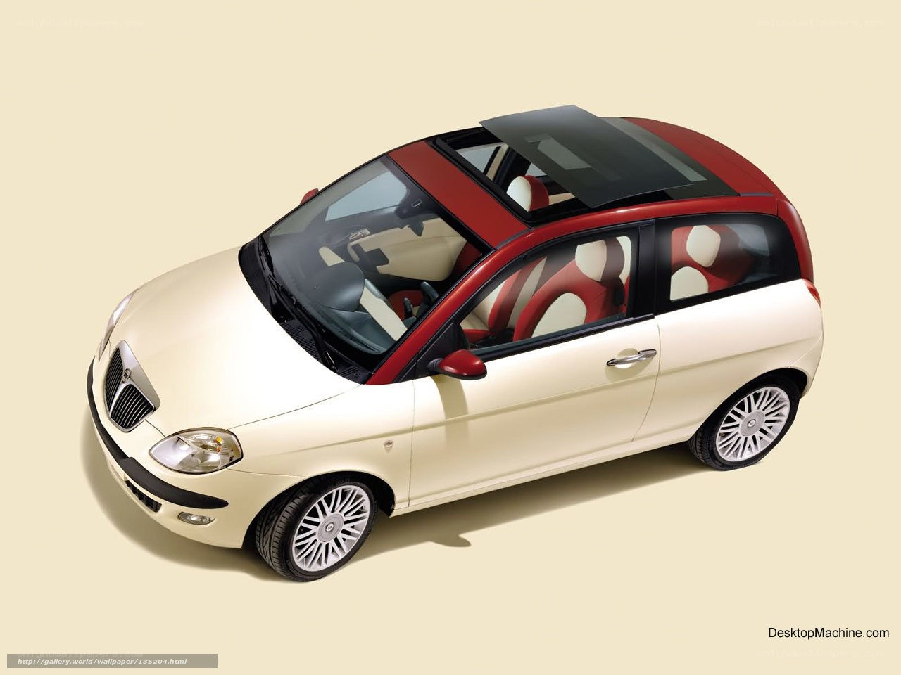 beige and red compact car
