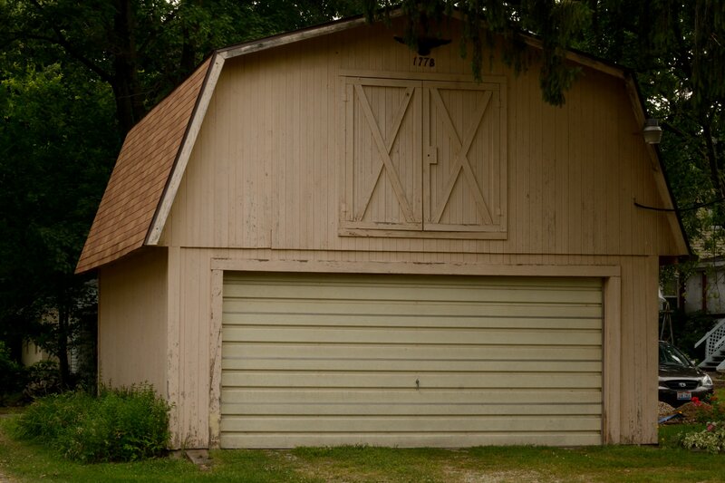 Beige Barn with Garage Door