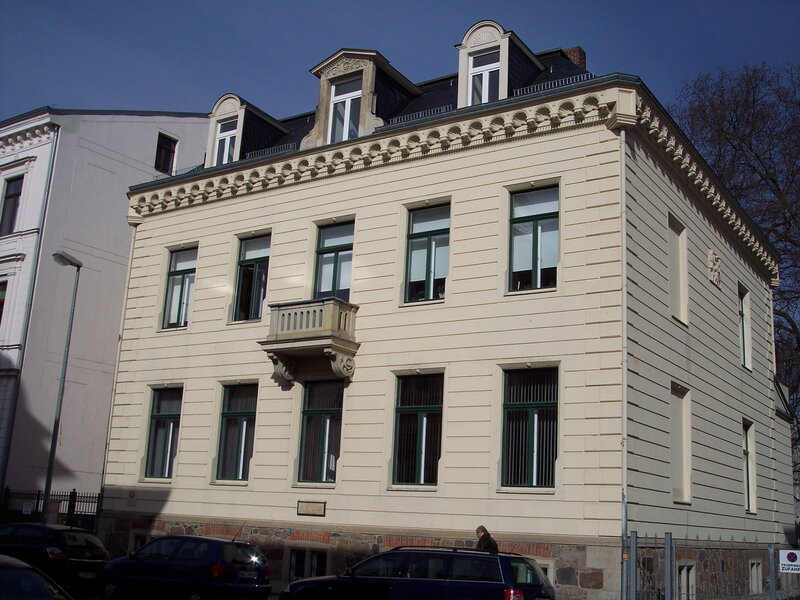 Beige building with dormer windows