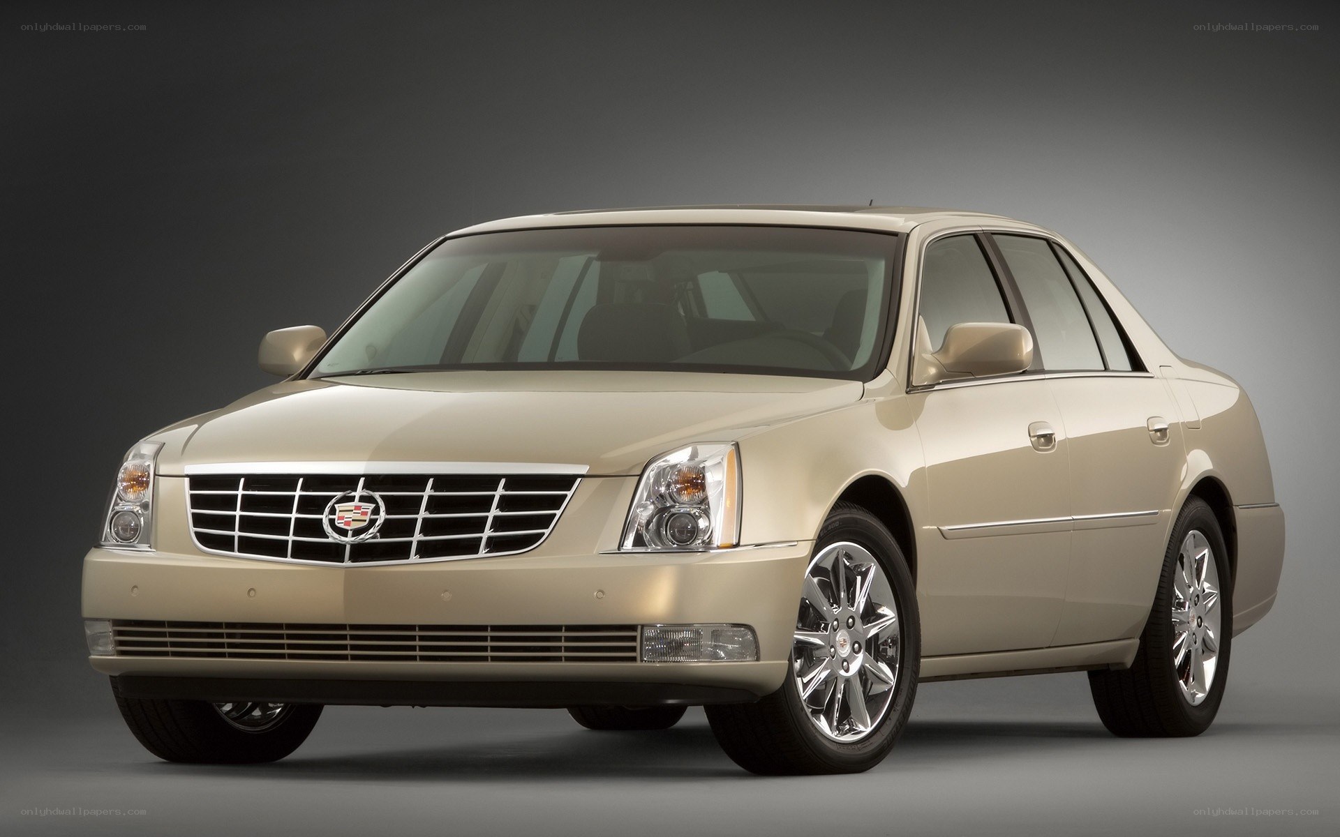 beige cadillac sedan