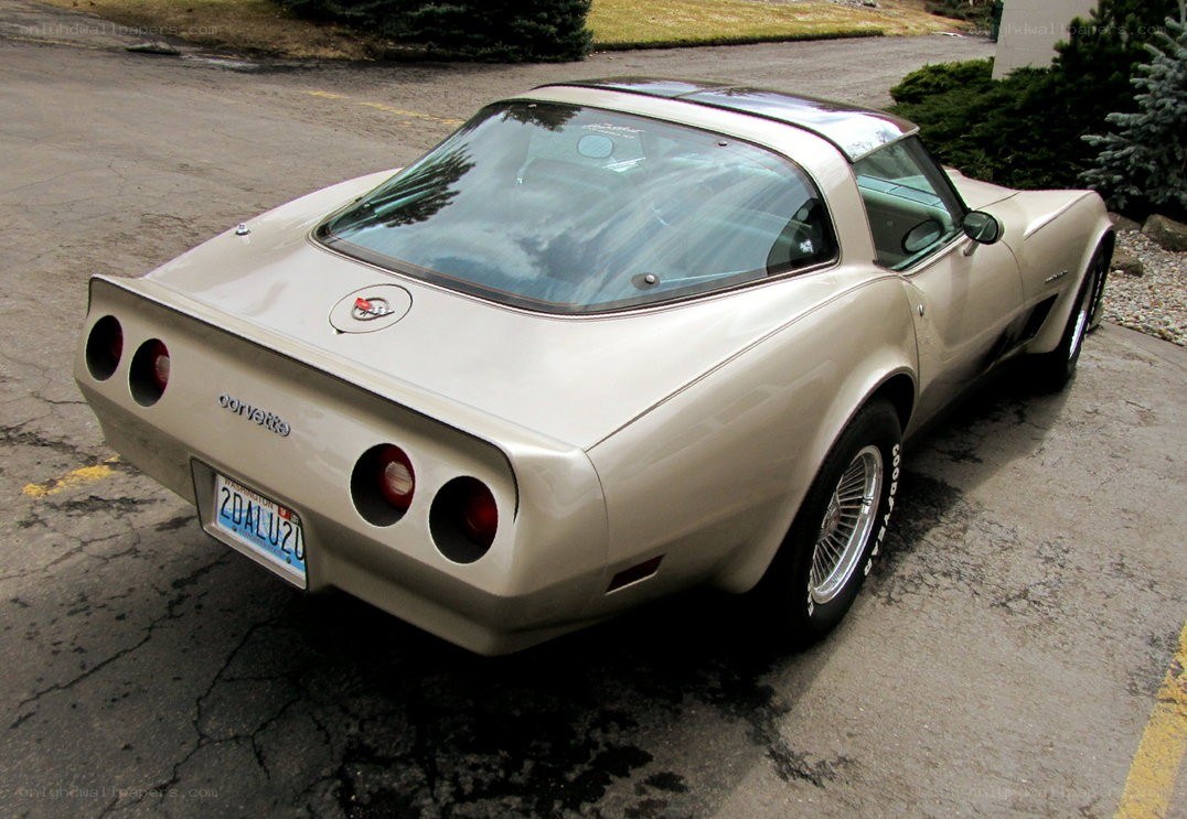 Beige Corvette C3 parked