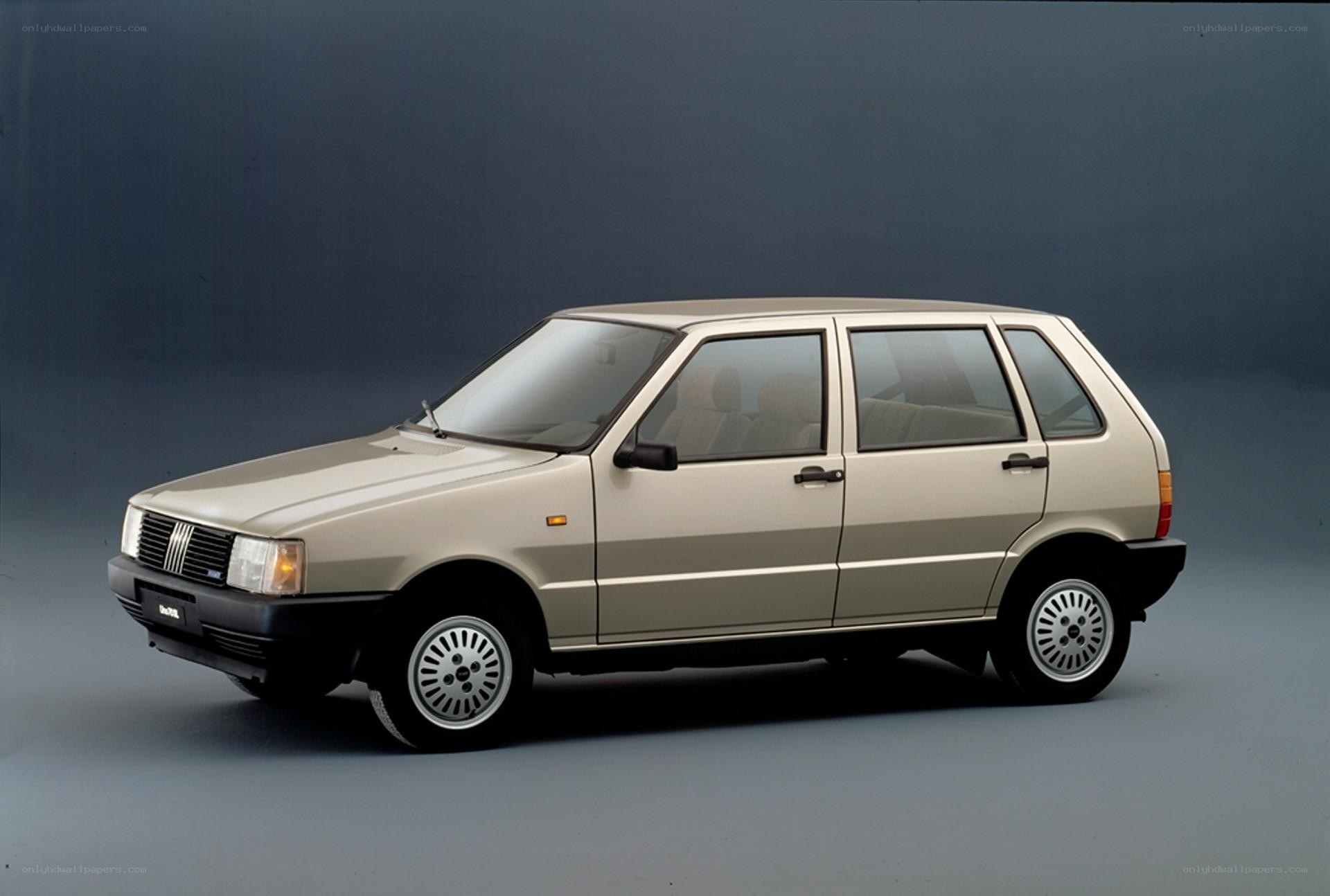 Beige Fiat Uno hatchback