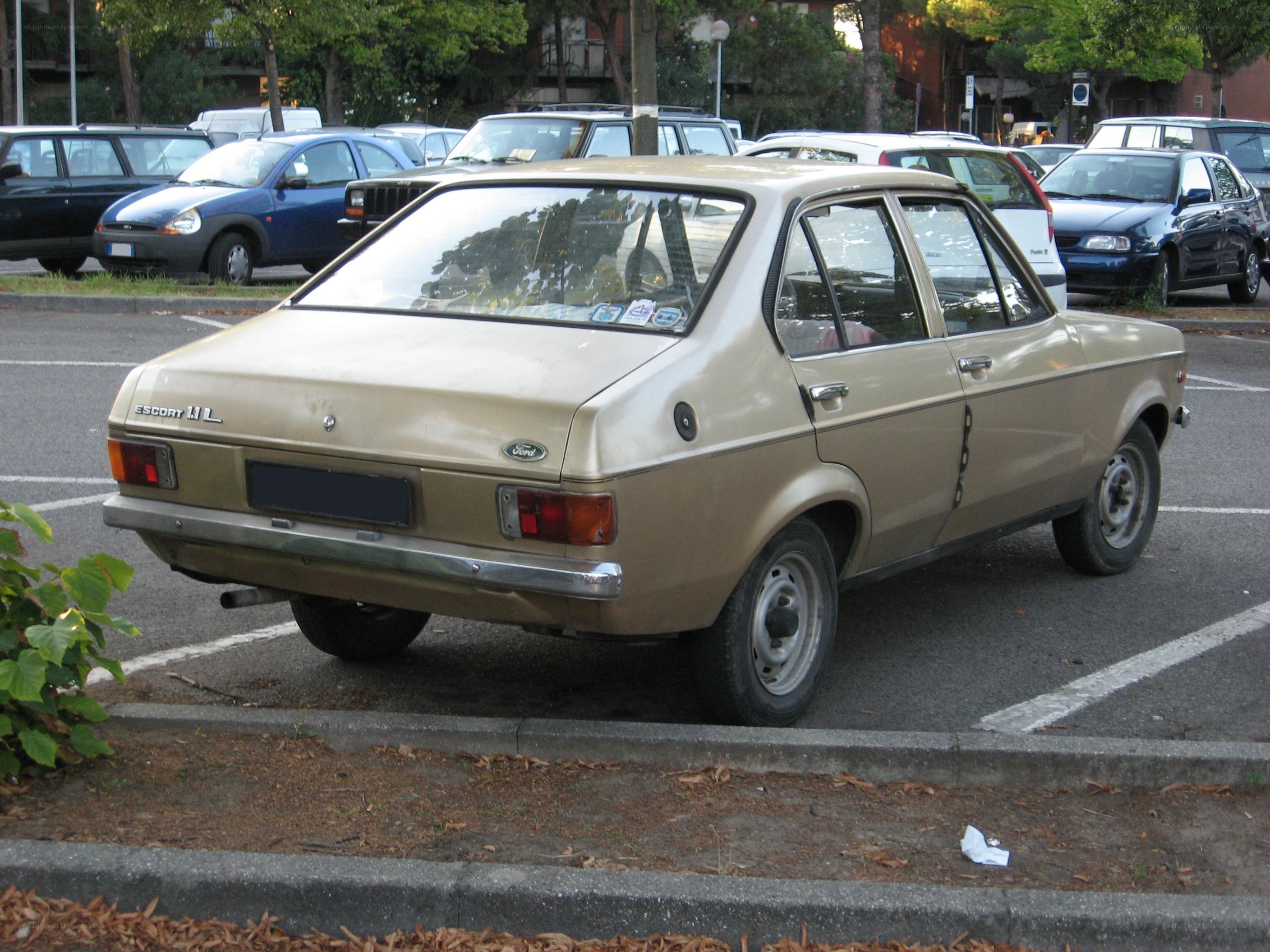 Beige Ford Escort in parking lot