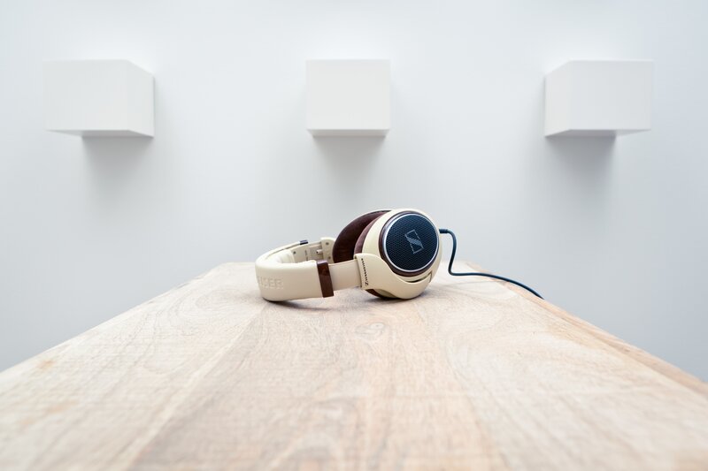 Beige Headphones on Table — White, Minimalist