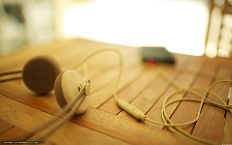 Beige Headphones on Wood
