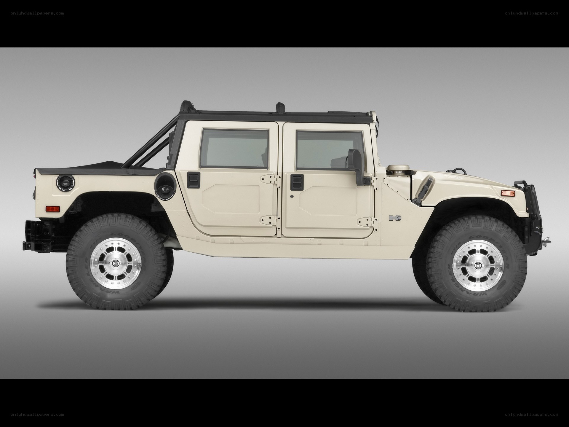 beige hummer h1 side view