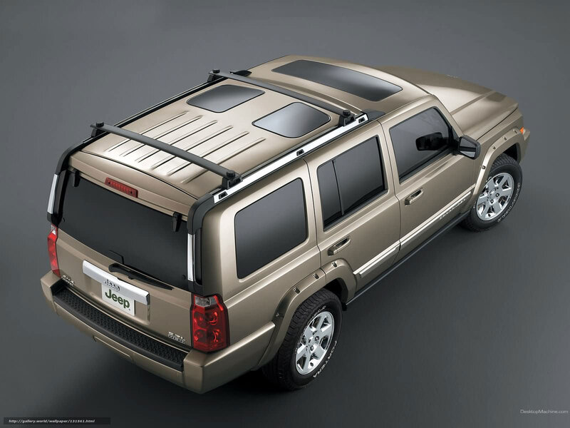 Beige Jeep with roof rack