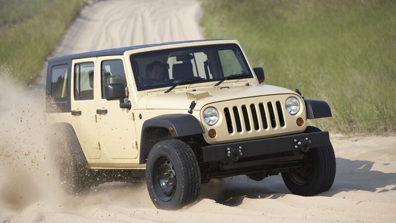 Beige Jeep Wrangler — Active